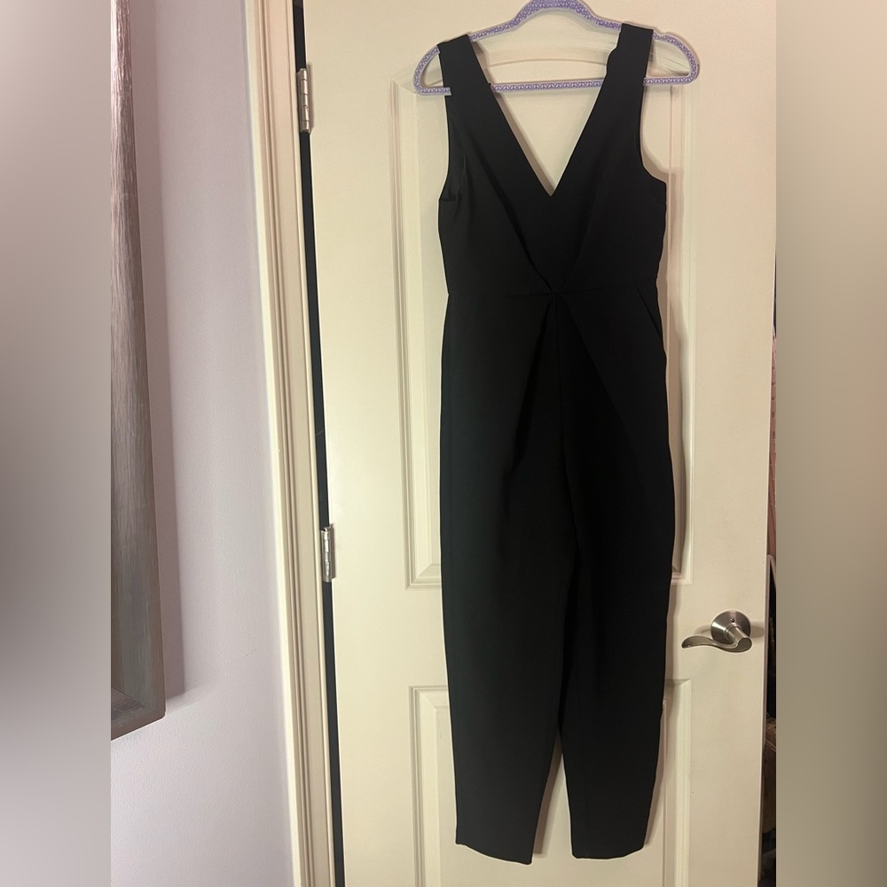 Black BCBGeneration jump suit. Size 4.
